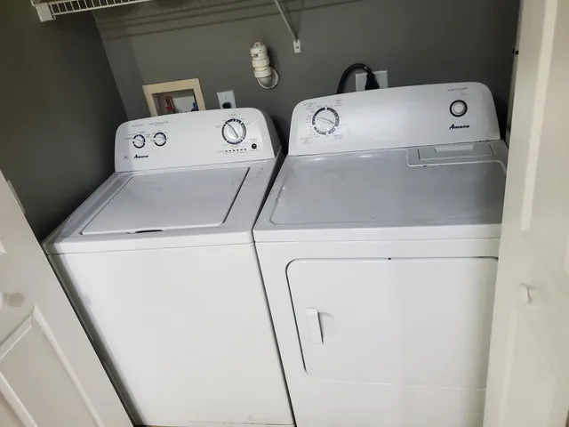 a utility room with dryer and washer