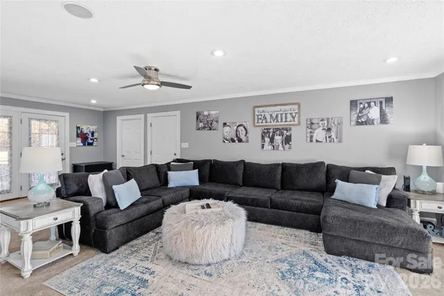 a living room with furniture and a couch