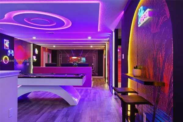 a room with musical instruments and air hockey table
