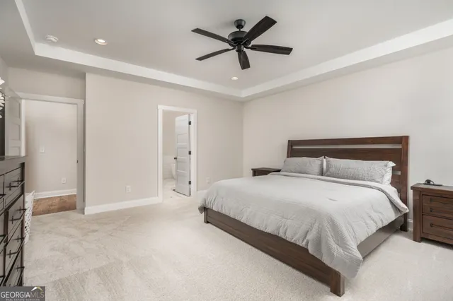 a bathroom with double sink and a mirror