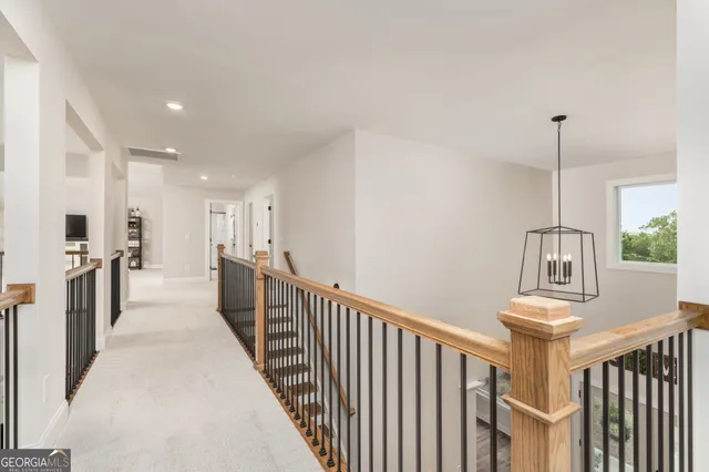 a bedroom with a bed and a television in it