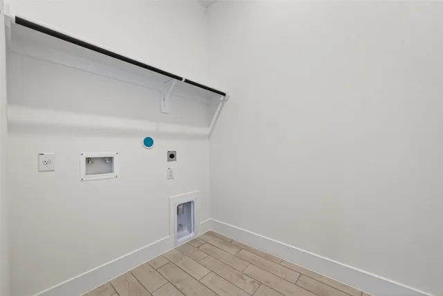 a view of small space with wooden floor