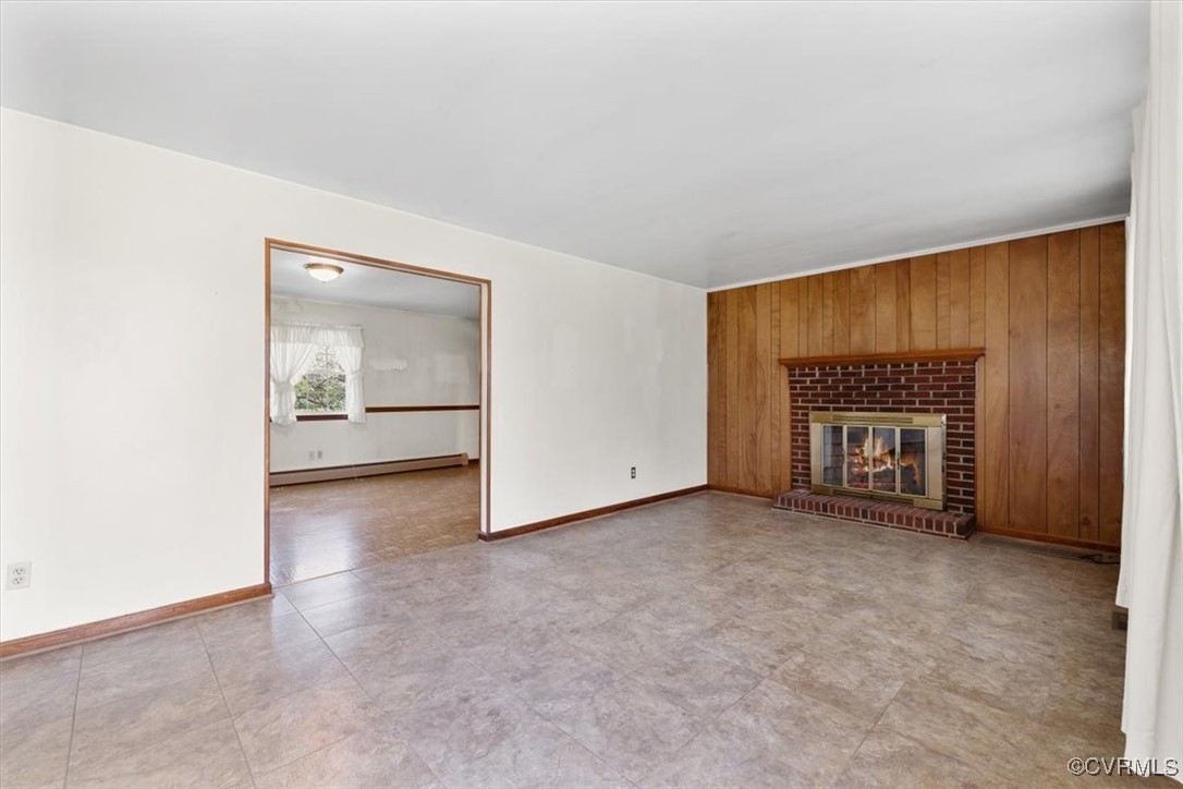 191 Petersburg Road Powhatan, VA 23139 - Photo 16 of 35 Unfurnished living room featuring a baseboard radi