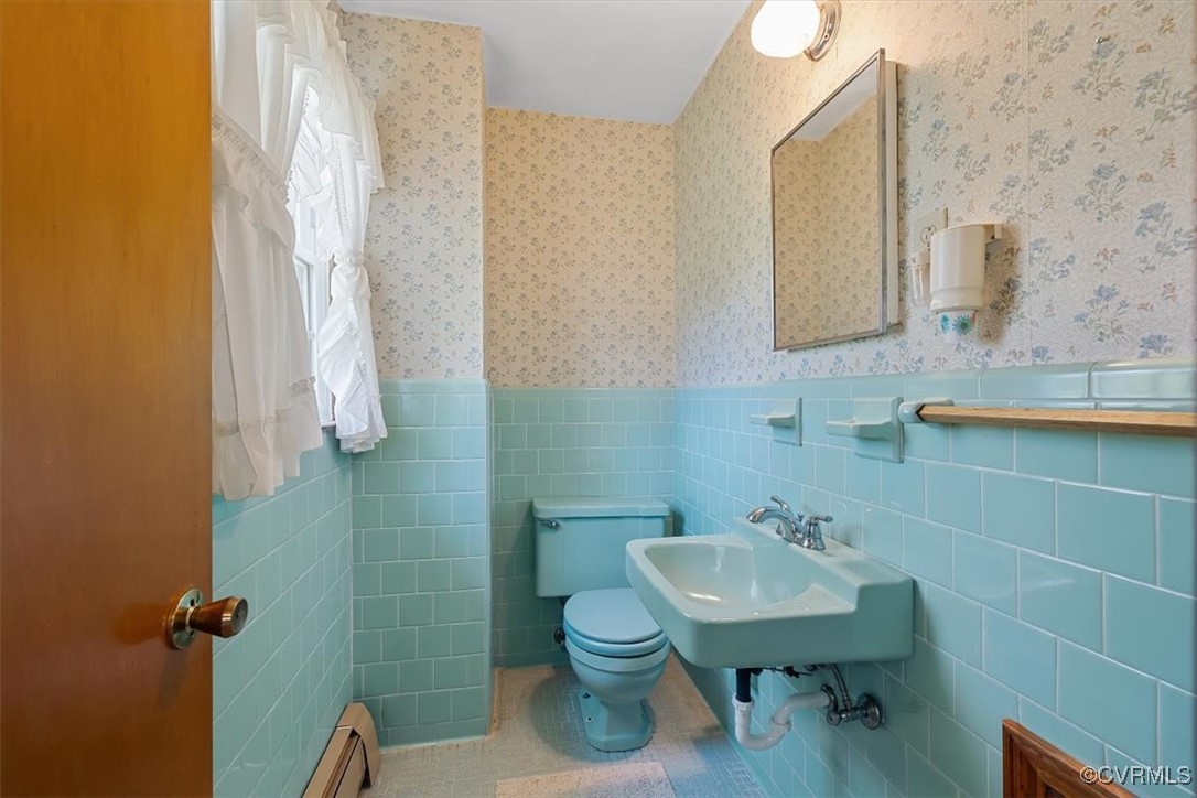 191 Petersburg Road Powhatan, VA 23139 - Photo 22 of 35 Bathroom featuring tile walls, wallpapered walls,