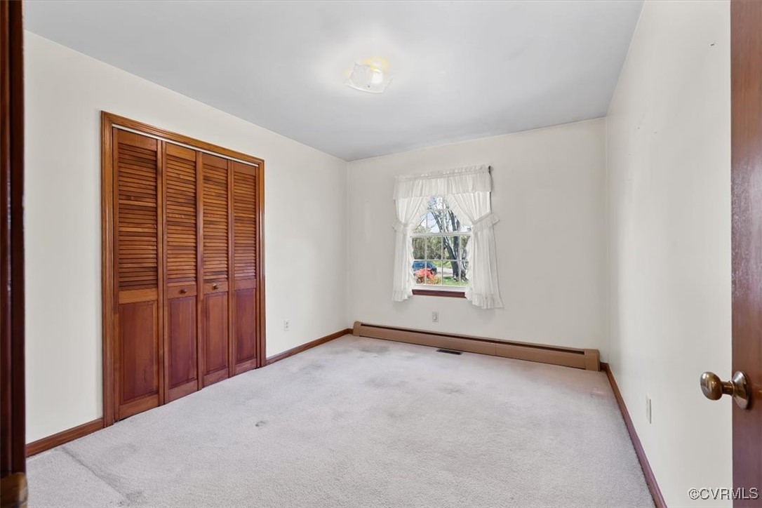 191 Petersburg Road Powhatan, VA 23139 - Photo 24 of 35 Unfurnished bedroom with baseboard heating, basebo