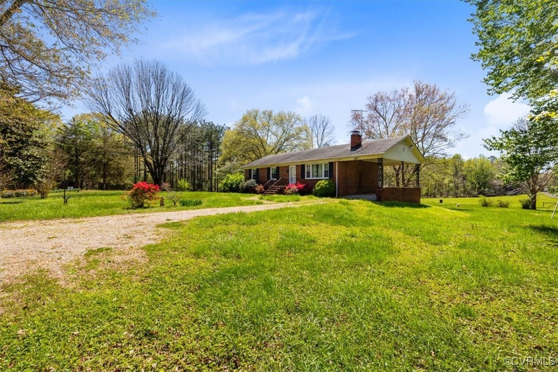191 Petersburg Road Powhatan, VA 23139 - Photo 32 of 35 View of front facade with a porch, dirt driveway,