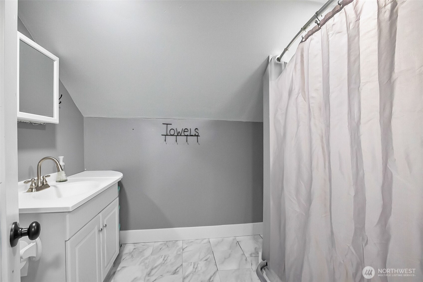 3503 Rockefeller Avenue Everett, WA 98201 - Photo 11 of 36 a bathroom with a sink and mirror