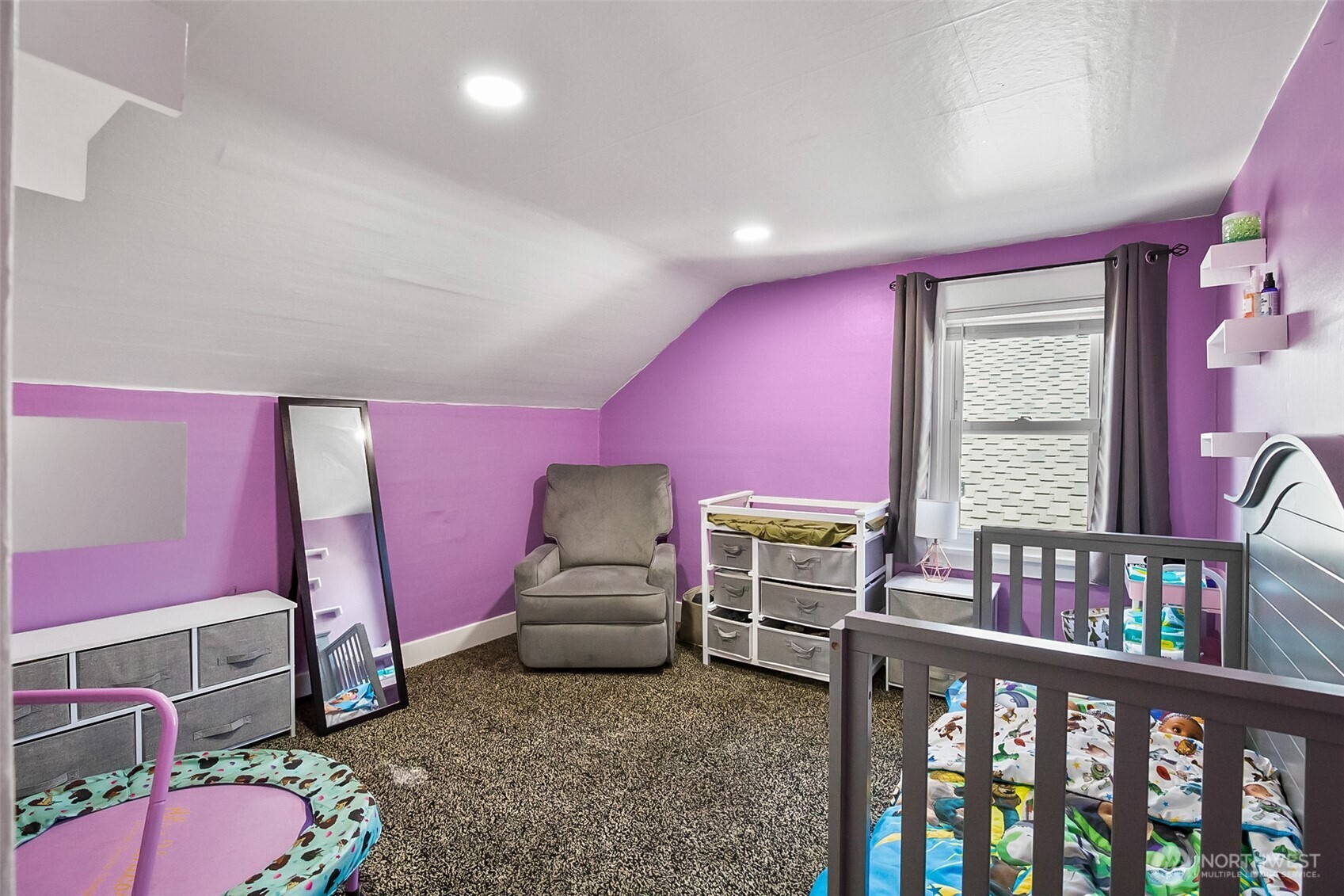 3503 Rockefeller Avenue Everett, WA 98201 - Photo 15 of 36 a bedroom with furniture and a book shelf