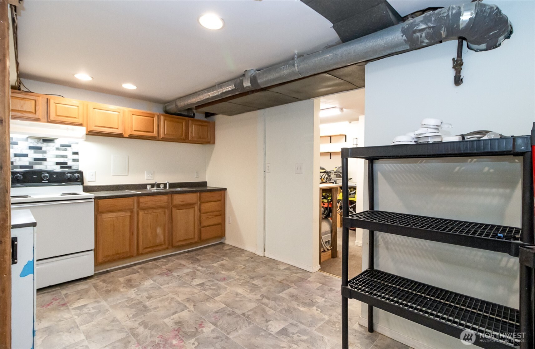 3503 Rockefeller Avenue Everett, WA 98201 - Photo 17 of 36 a kitchen with refrigerator and window