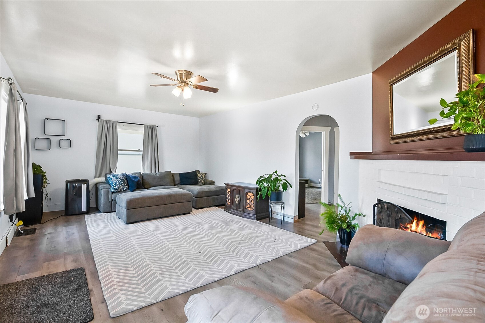 3503 Rockefeller Avenue Everett, WA 98201 - Photo 24 of 36 a bedroom with furniture and a fireplace