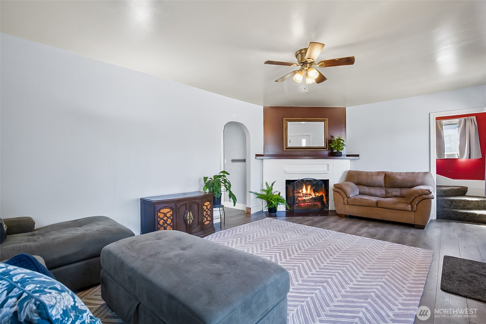 3503 Rockefeller Avenue Everett, WA 98201 - Photo 25 of 36 a living room with furniture and a fireplace