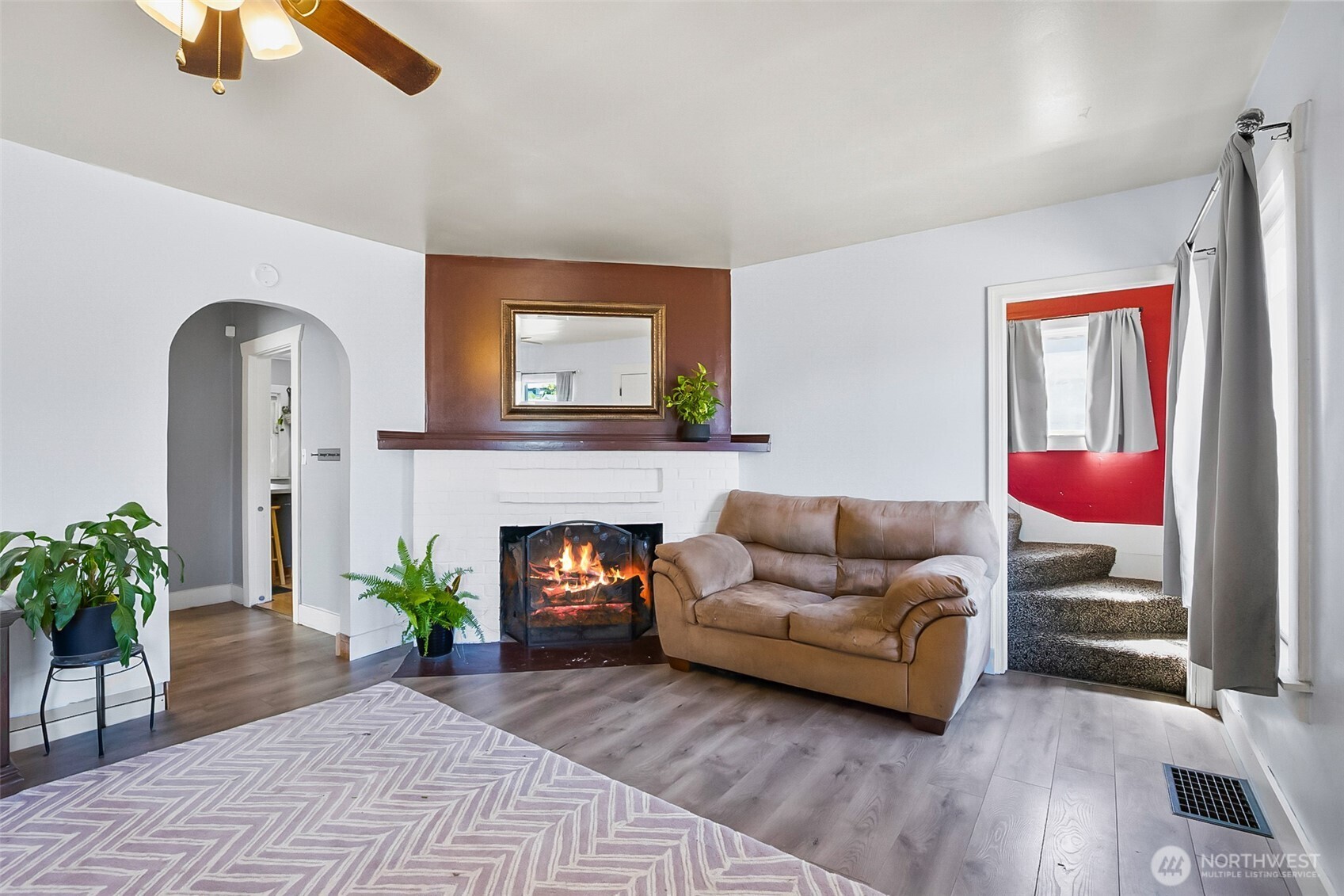 3503 Rockefeller Avenue Everett, WA 98201 - Photo 26 of 36 a living room with furniture and a fireplace