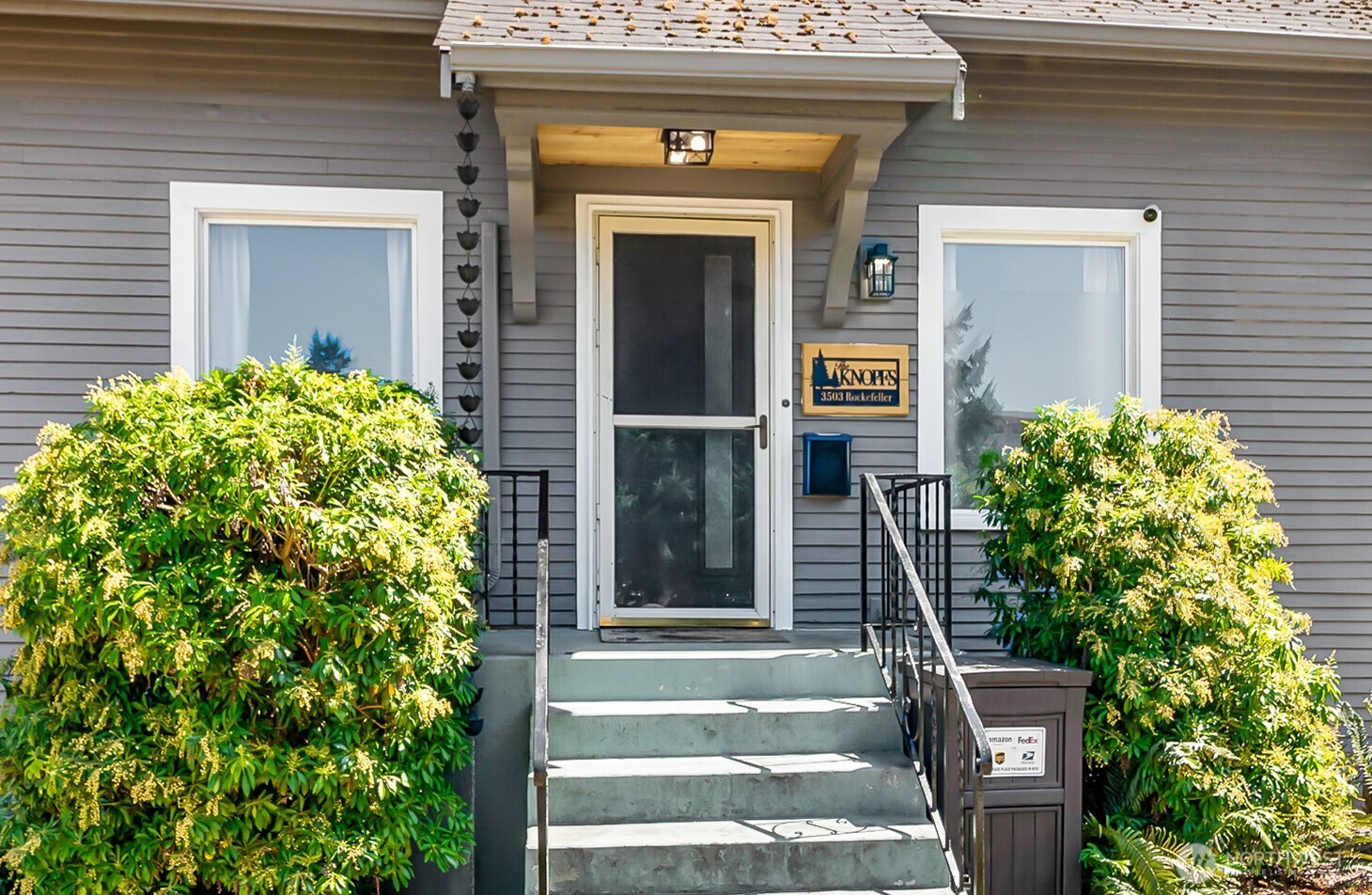 3503 Rockefeller Avenue Everett, WA 98201 - Photo 35 of 36 front view of a house with a potted plant
