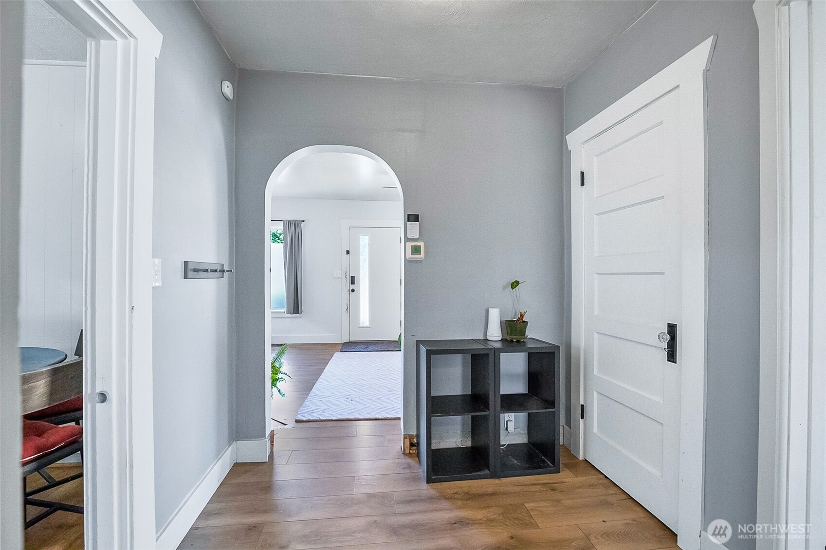 3503 Rockefeller Avenue Everett, WA 98201 - Photo 8 of 36 a view of a hallway with wooden floor and staircase