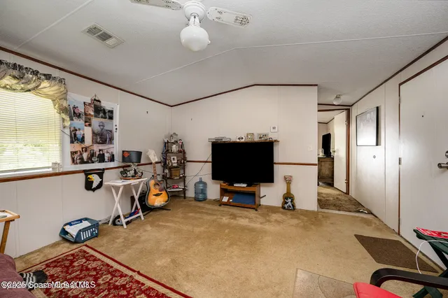 a kitchen with sink cabinets and refrigerator