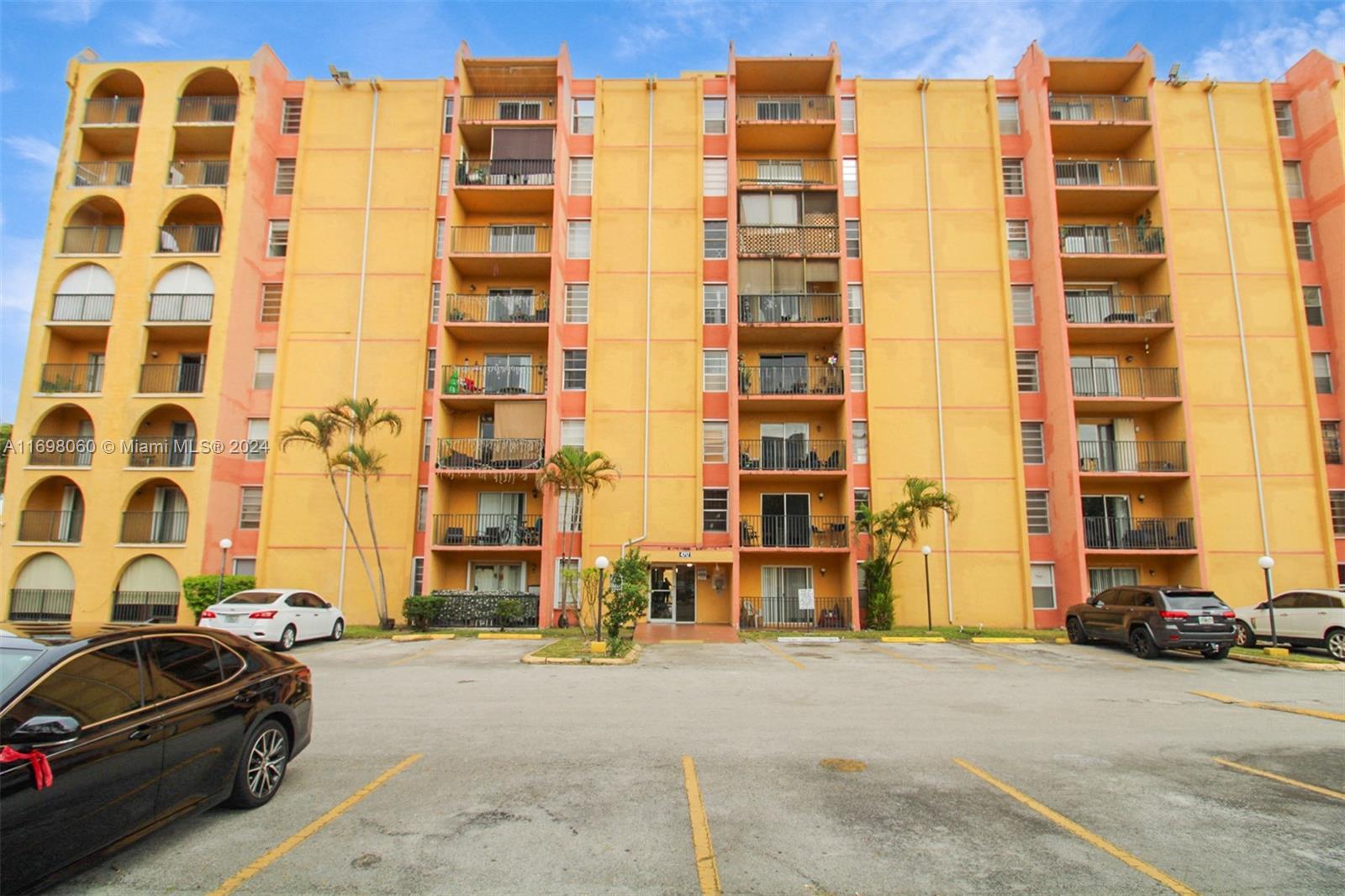 4717 Northwest 7th Street, Unit 60410 Miami, FL 33126 - Photo 3 of 20 front view of a building with a street