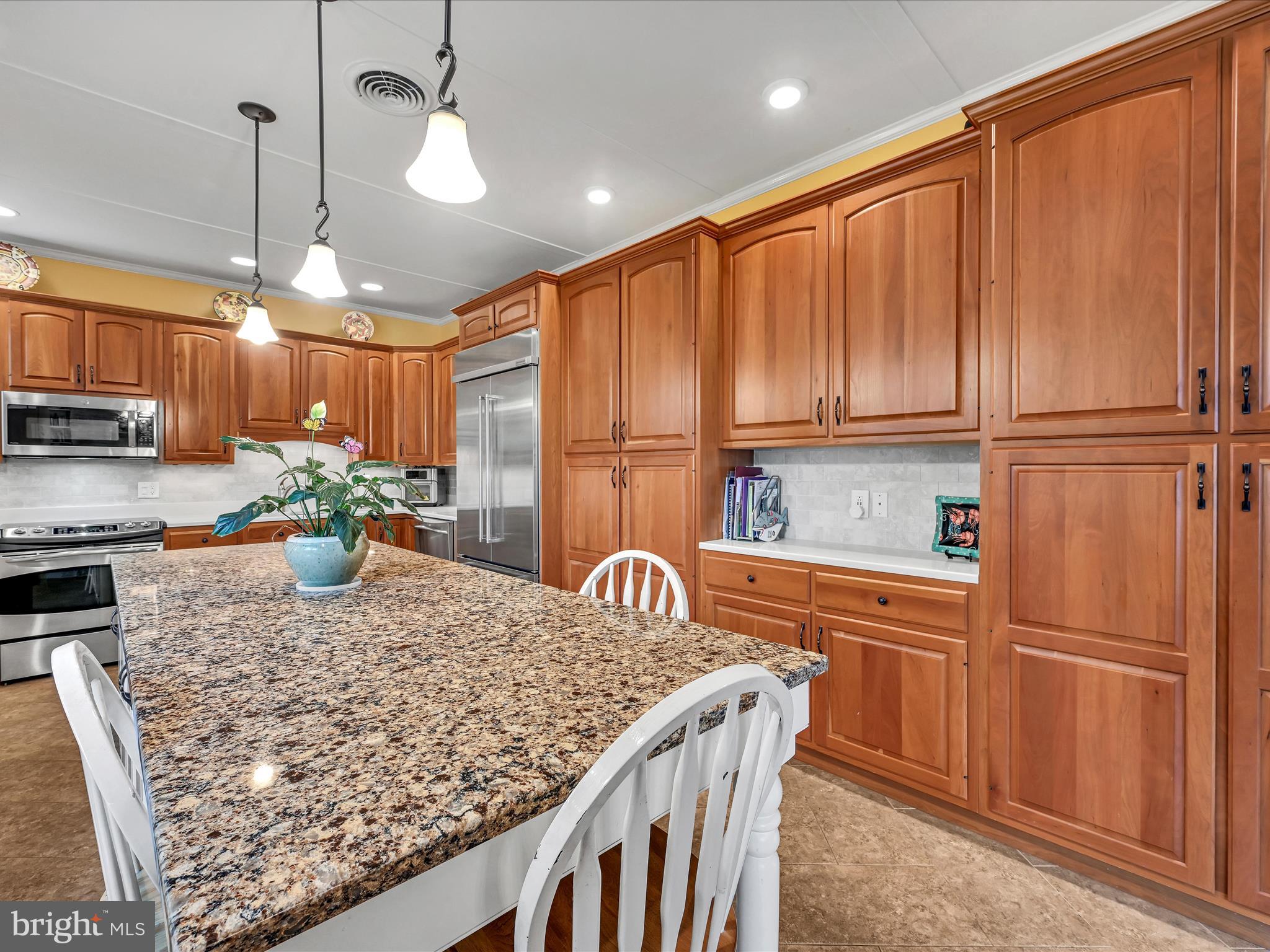 125 Burd Coleman Road Lebanon, PA 17042 - Photo 5 of 43 Custom cherry cabinetry and a chef's island