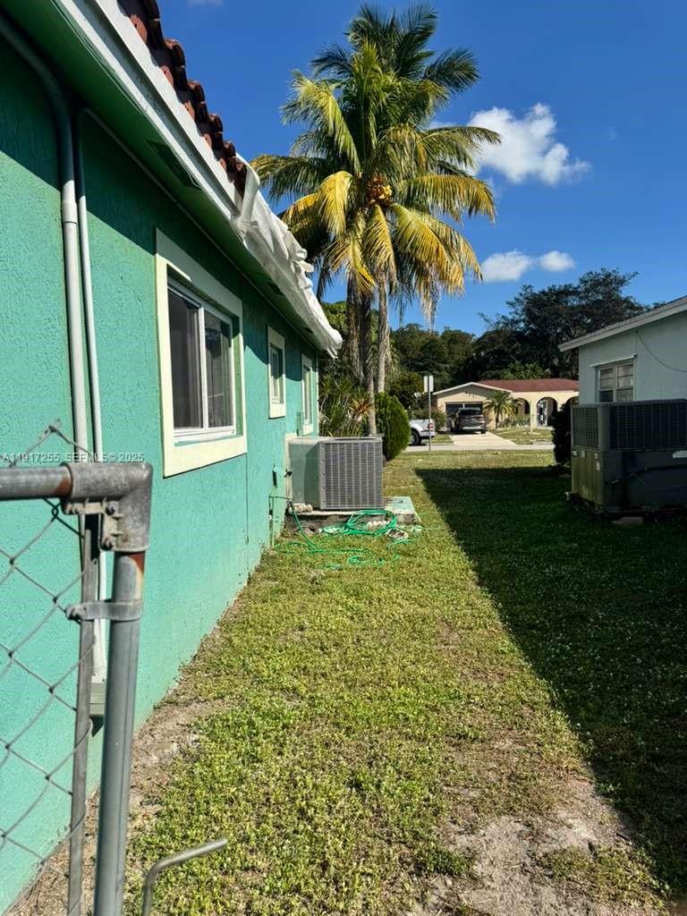 820 Southwest 49th Terrace Margate, FL 33068 - Photo 14 of 15 a view of house with backyard space and balcony
