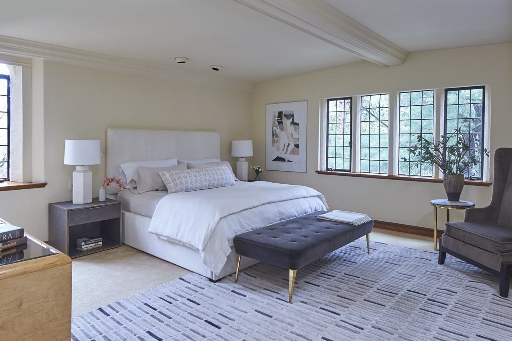 89 Fletcher Road Belmont, MA 02478 - Photo 15 of 32 a bedroom with a bed wooden floor and a large window