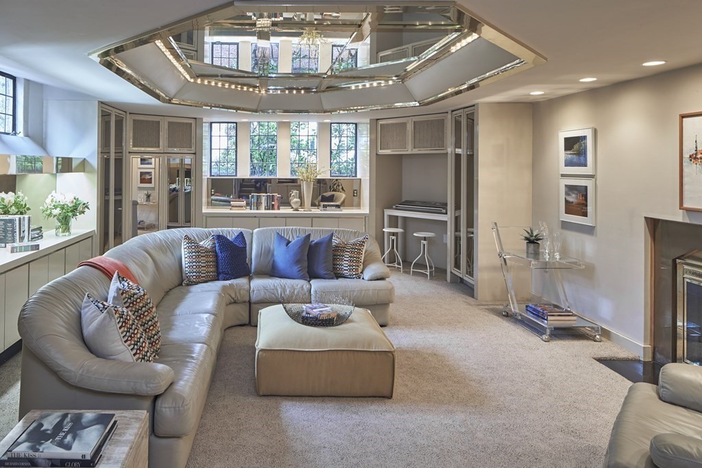 89 Fletcher Road Belmont, MA 02478 - Photo 20 of 32 a living room with furniture and a chandelier