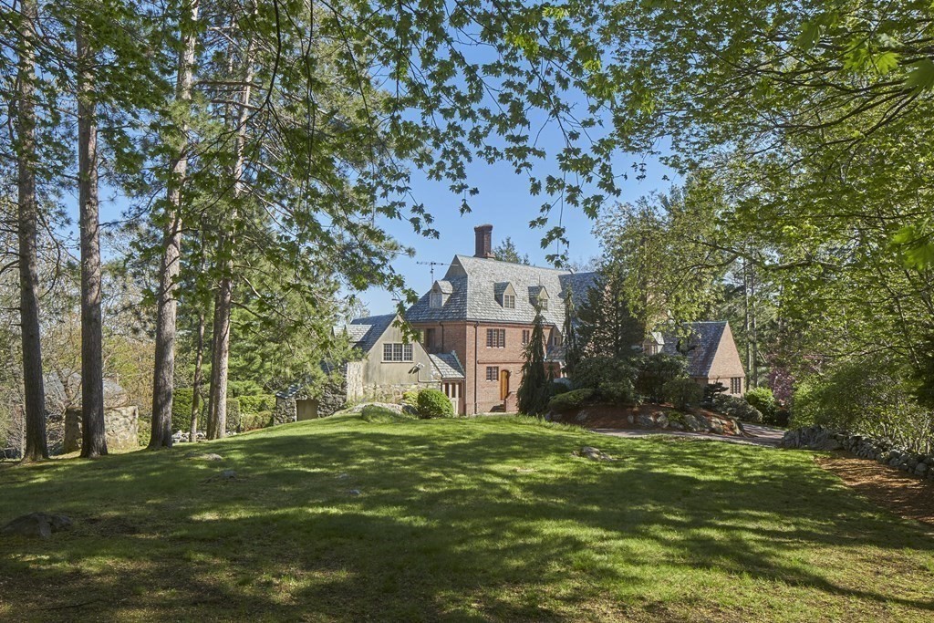 89 Fletcher Road Belmont, MA 02478 - Photo 23 of 32 a view of a house with a big yard and large trees