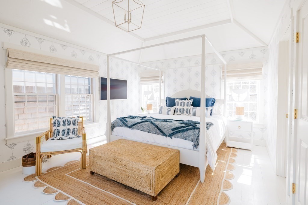 23 Kittiwake Lane Nantucket, MA 02554 - Photo 13 of 36 a living room with furniture and a large window