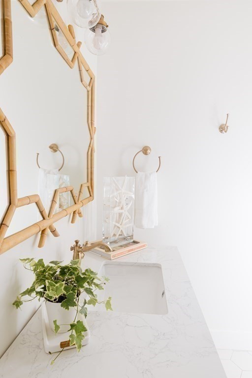 23 Kittiwake Lane Nantucket, MA 02554 - Photo 16 of 36 a bathroom with a sink