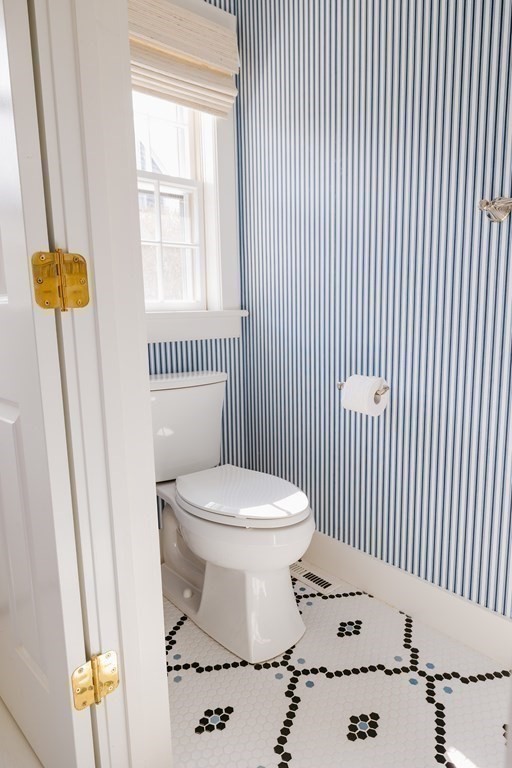 23 Kittiwake Lane Nantucket, MA 02554 - Photo 17 of 36 a bathroom with a sink a toilet and a window