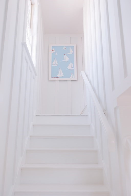 23 Kittiwake Lane Nantucket, MA 02554 - Photo 19 of 36 a view of staircase with white walls and a window
