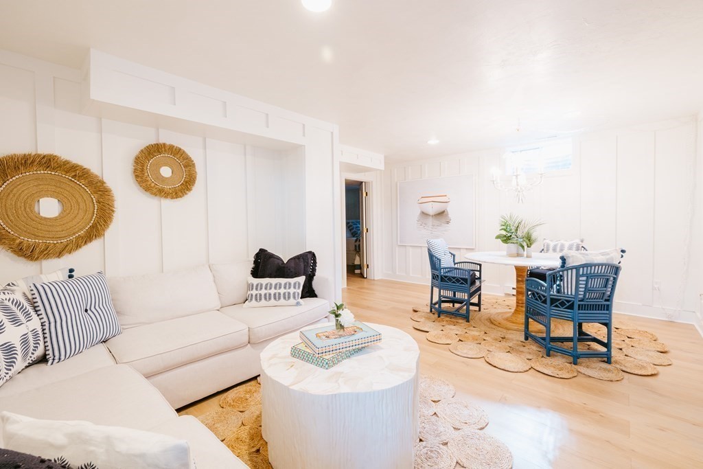 23 Kittiwake Lane Nantucket, MA 02554 - Photo 29 of 36 a living room with furniture and a chair
