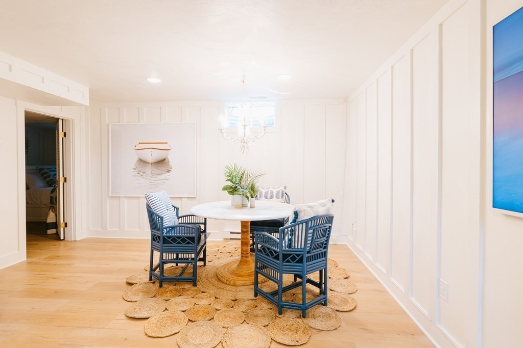 23 Kittiwake Lane Nantucket, MA 02554 - Photo 31 of 36 a view of a dining room with furniture and wooden floor