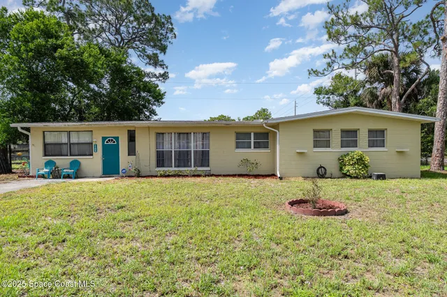 front view of a house and a yard