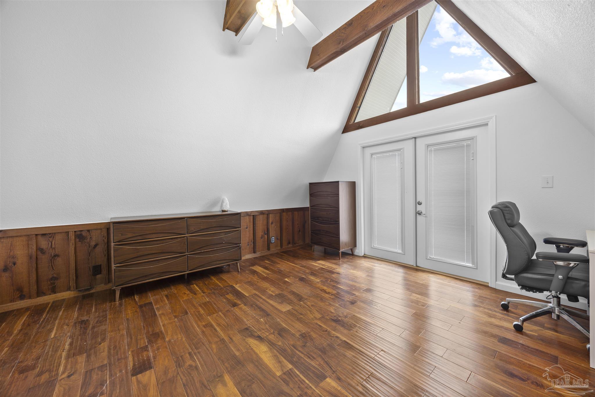 889 Dolphin Road Milton, FL 32583 - Photo 30 of 67 a view of workspace with wooden floor and furniture