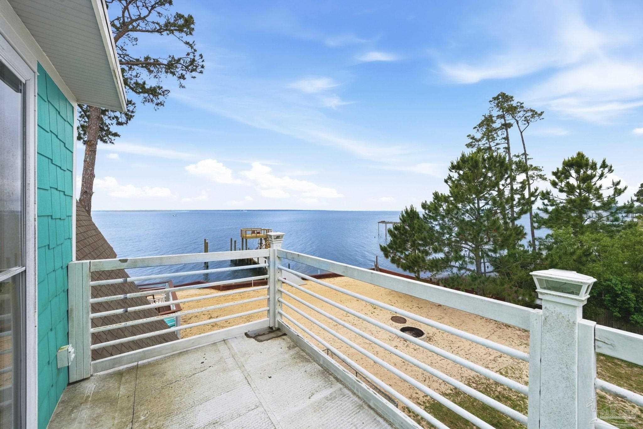 889 Dolphin Road Milton, FL 32583 - Photo 54 of 67 a view of balcony with furniture