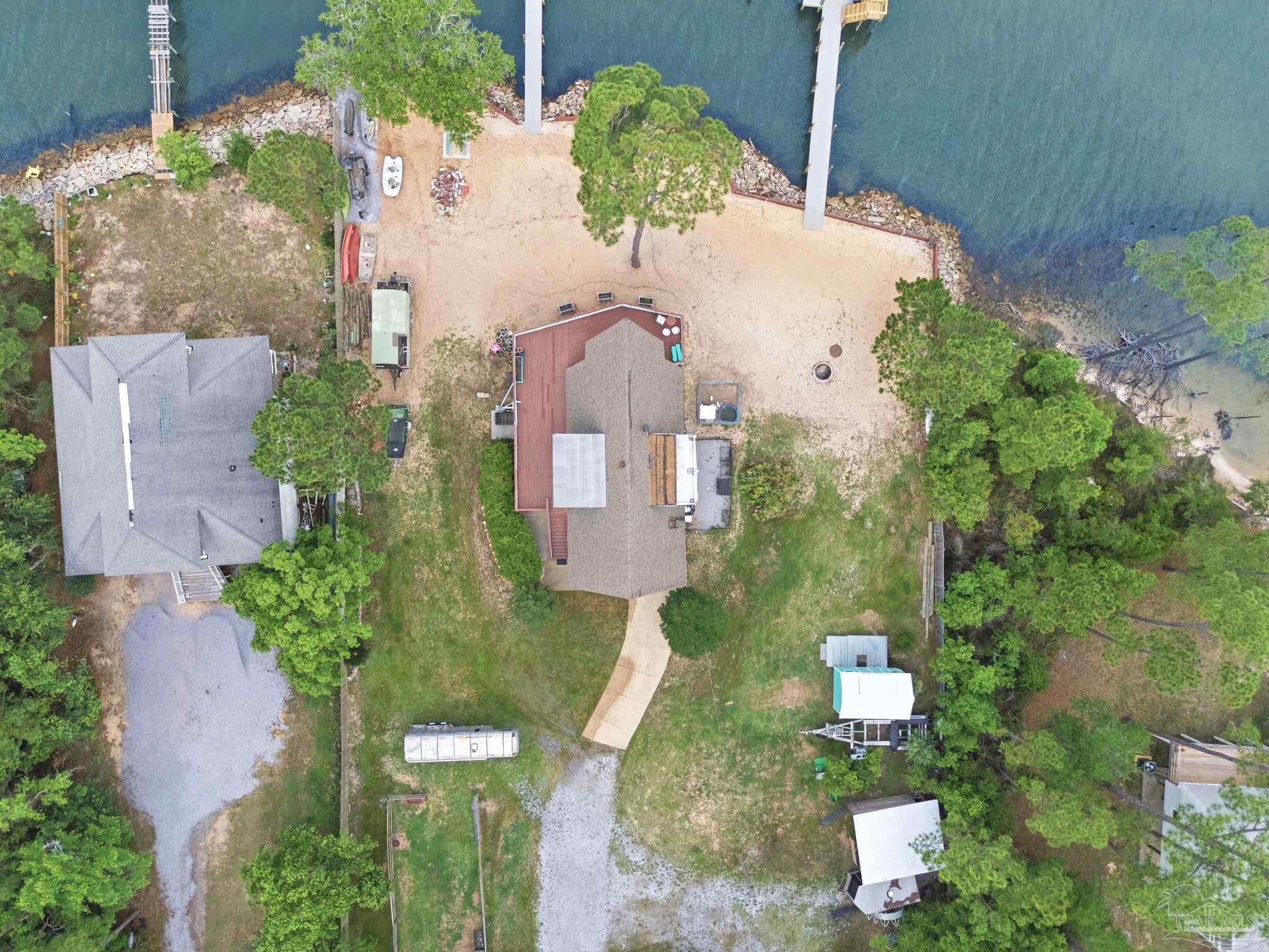 889 Dolphin Road Milton, FL 32583 - Photo 64 of 67 an aerial view of a house