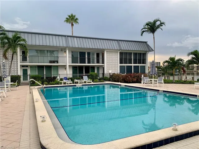 a view of a house with a swimming pool