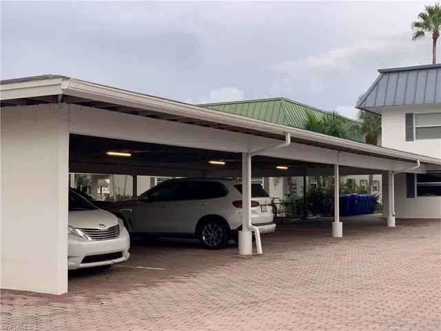 a car parked in front of garage
