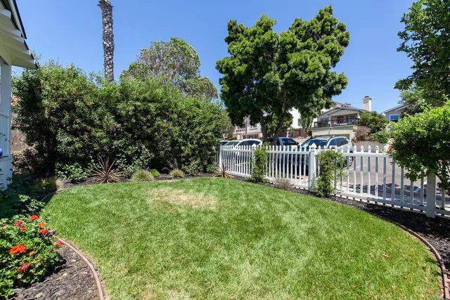 a view of a balcony with wooden floor