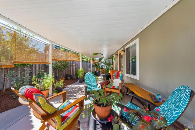 a outdoor living space with furniture and garden view