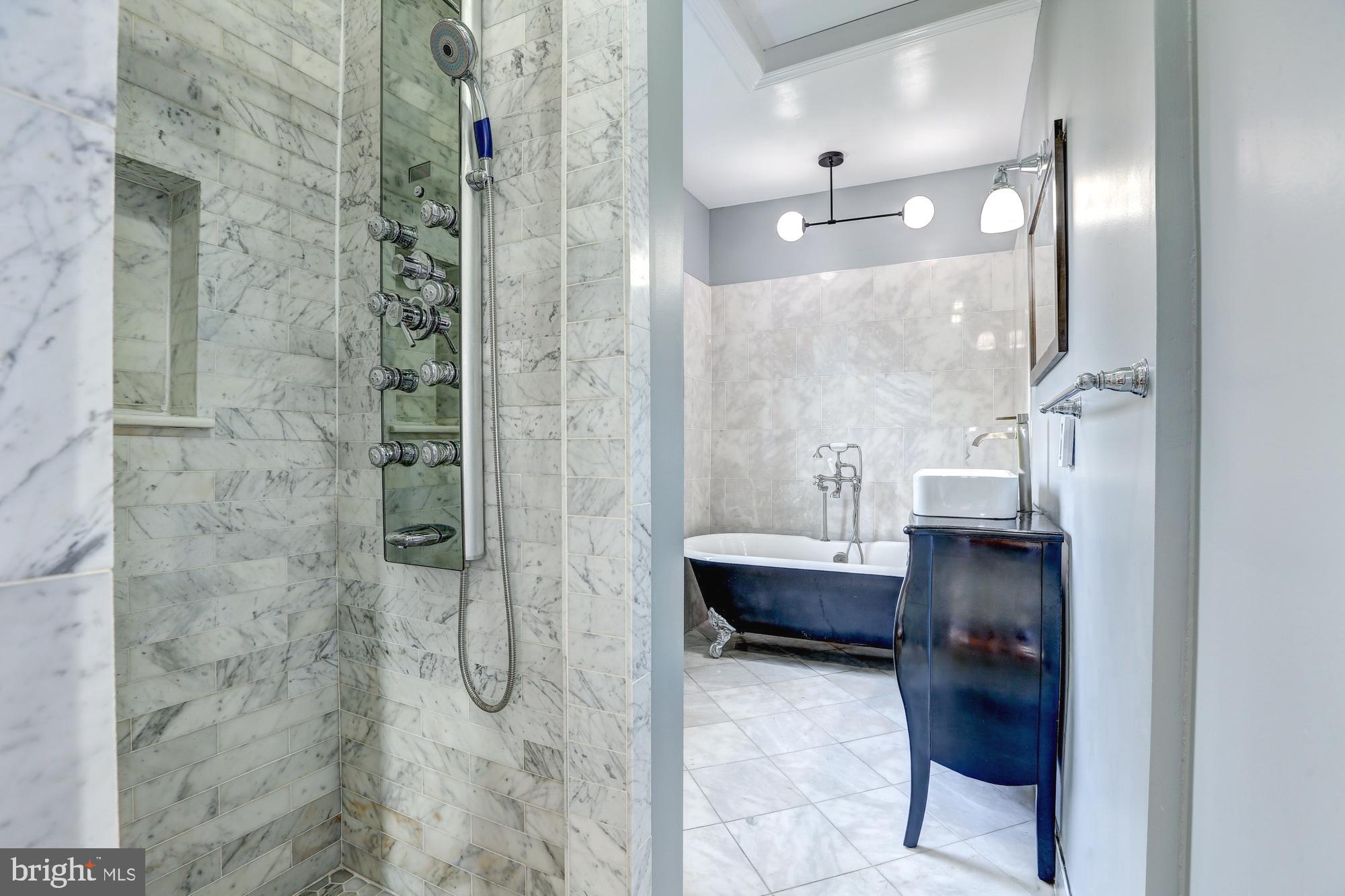 1929 Park Road Northwest Washington, DC 20010 - Photo 37 of 61 En-suite bathroom with soaking tub and shower