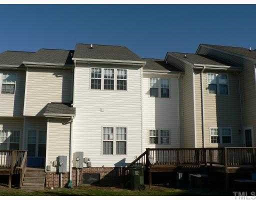 4205 Standing Rock Way Raleigh, NC 27604 - Photo 5 of 7 a front view of a house with balcony