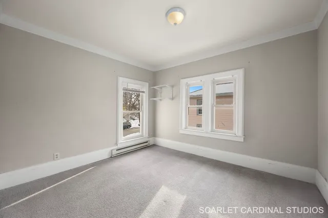 an empty room with windows