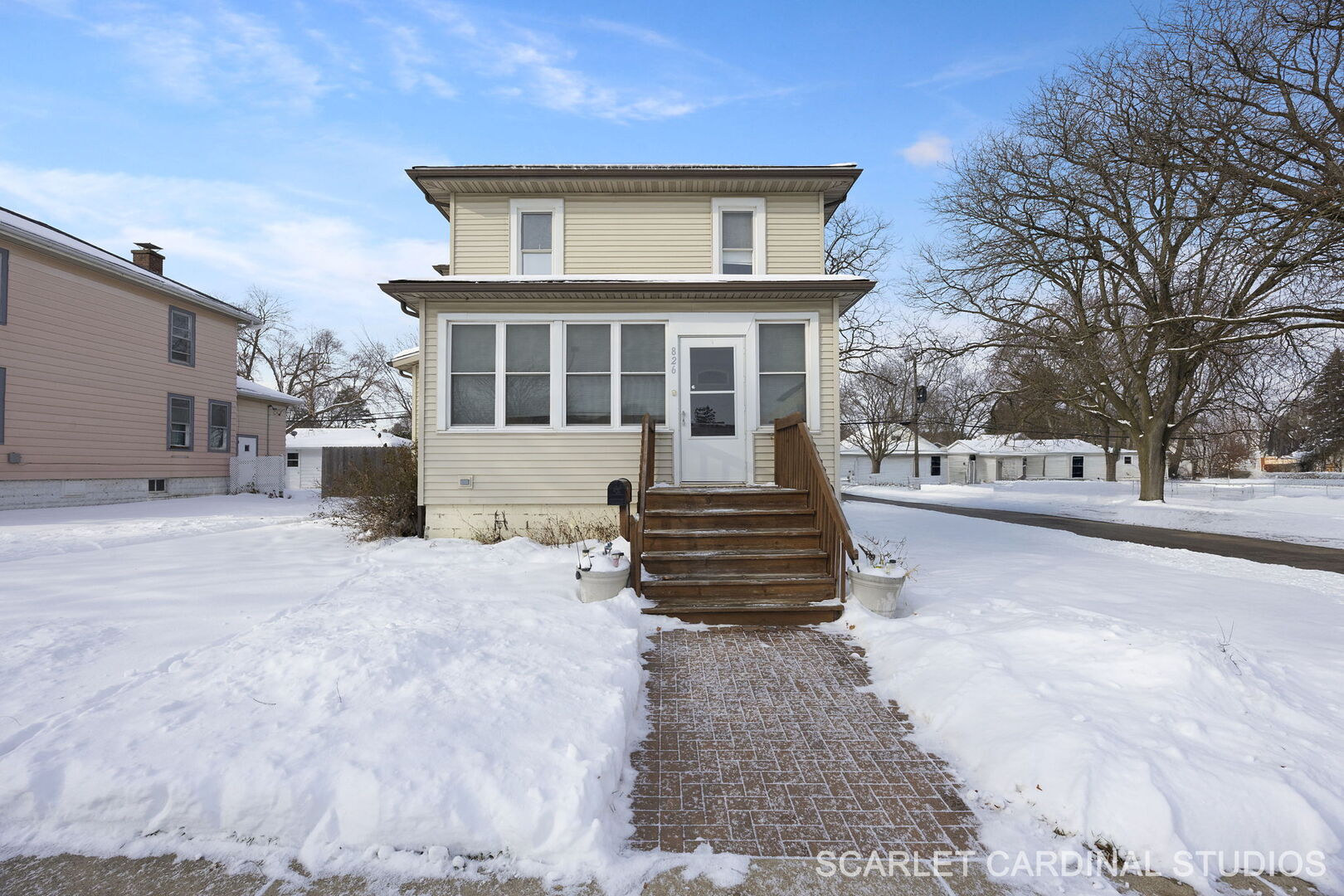 826 North 3rd Street Rochelle, IL 61068 - Photo 2 of 22 a front view of a house with a yard