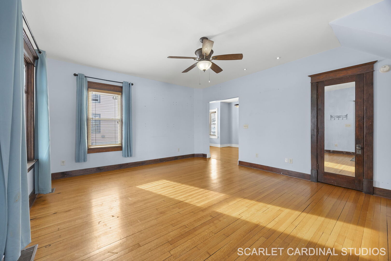 826 North 3rd Street Rochelle, IL 61068 - Photo 4 of 22 a view of an empty room with window and wooden floor