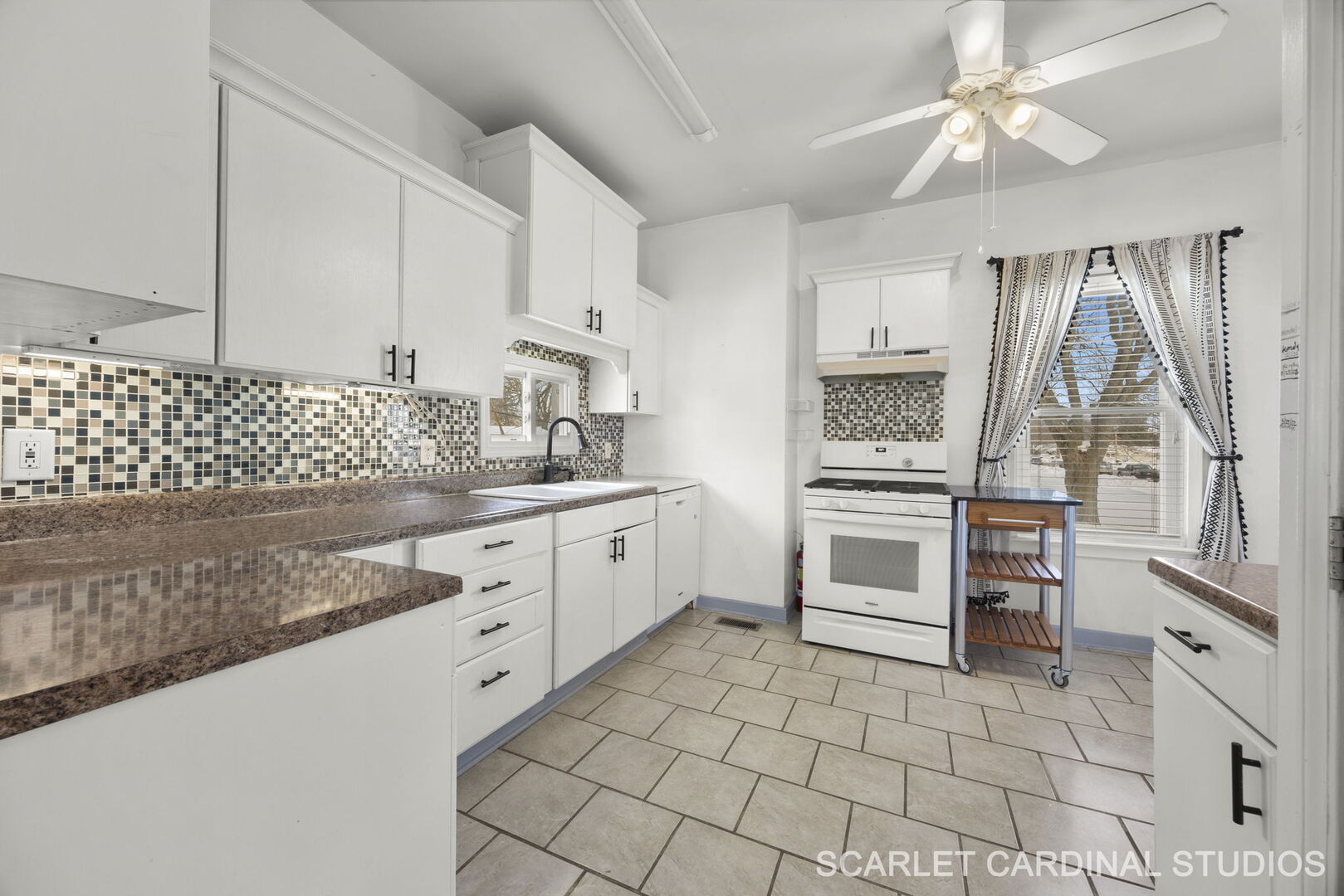 826 North 3rd Street Rochelle, IL 61068 - Photo 8 of 22 a kitchen with white cabinets and appliances