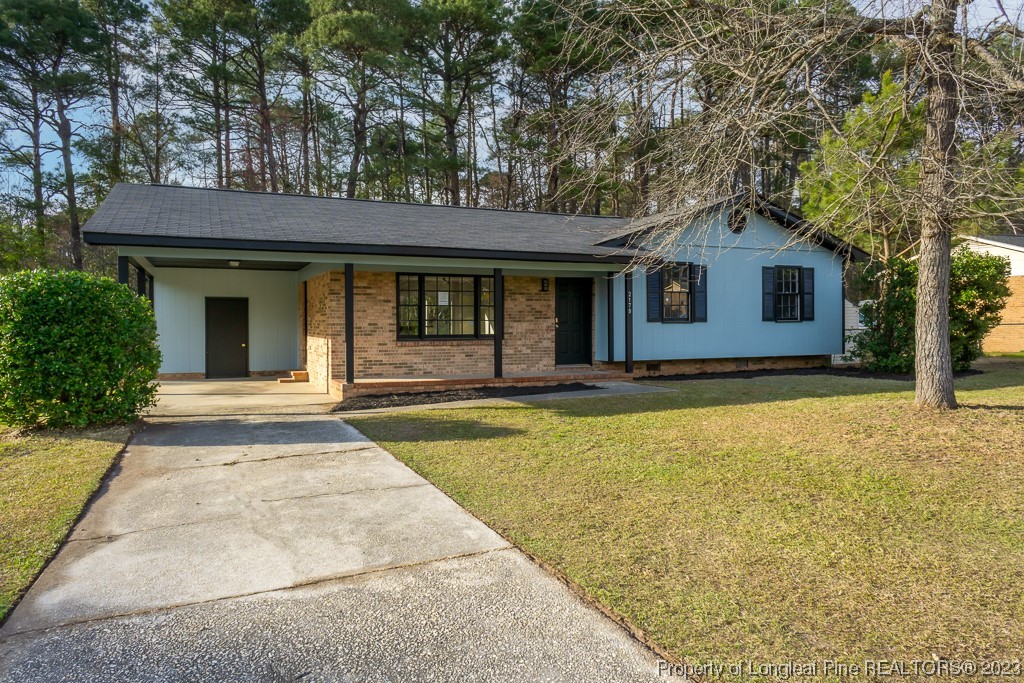 2179 Shaw Rd Extension Fayetteville, NC 28311 - Photo 2 of 42 a house view with a outdoor space
