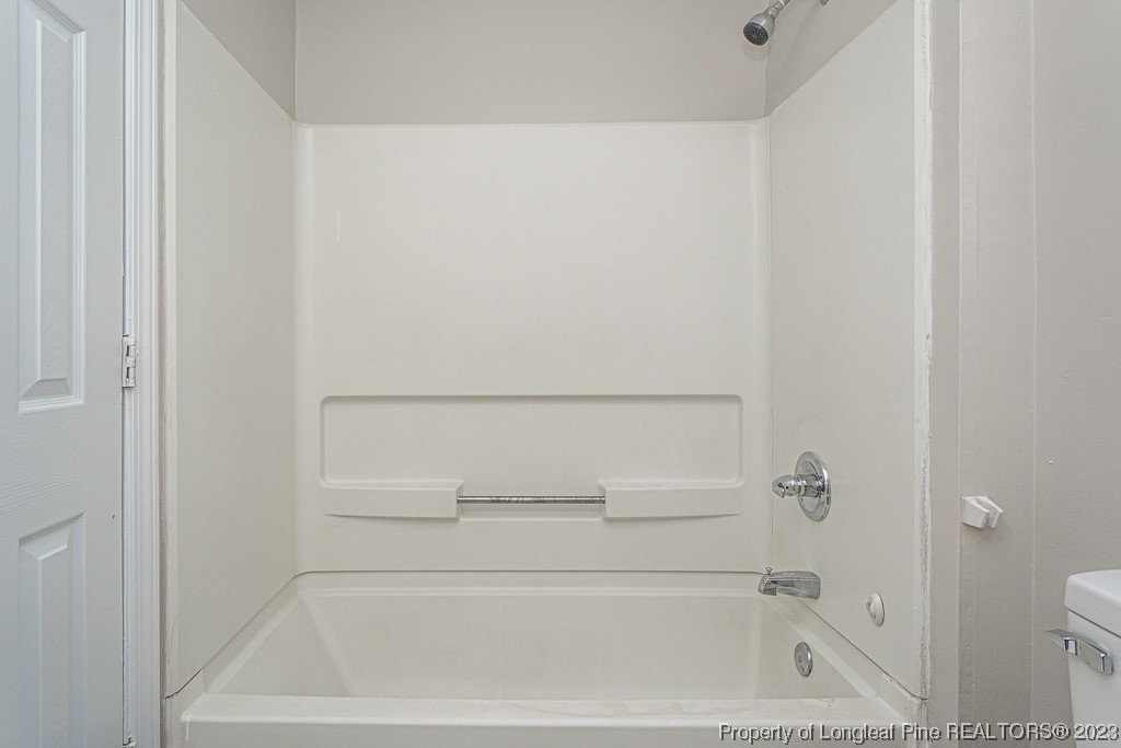 2179 Shaw Rd Extension Fayetteville, NC 28311 - Photo 29 of 42 a bathroom with a bathtub