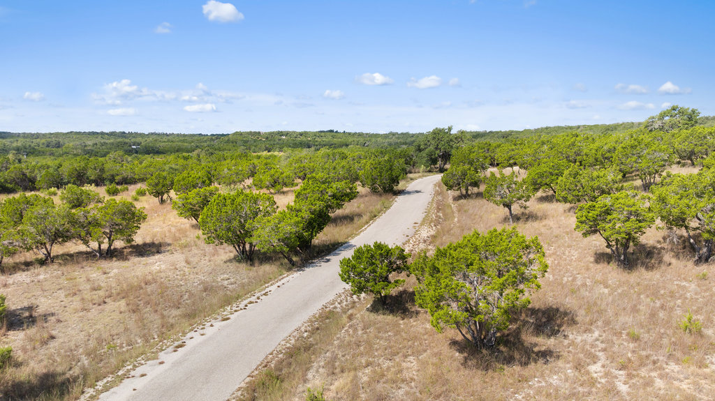 5818 Ranch Road 165 Blanco, TX 78606 - Photo 19 of 24 a view of a pathway with a yard