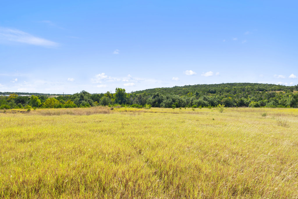 5818 Ranch Road 165 Blanco, TX 78606 - Photo 7 of 24 a view of an ocean and a mountain