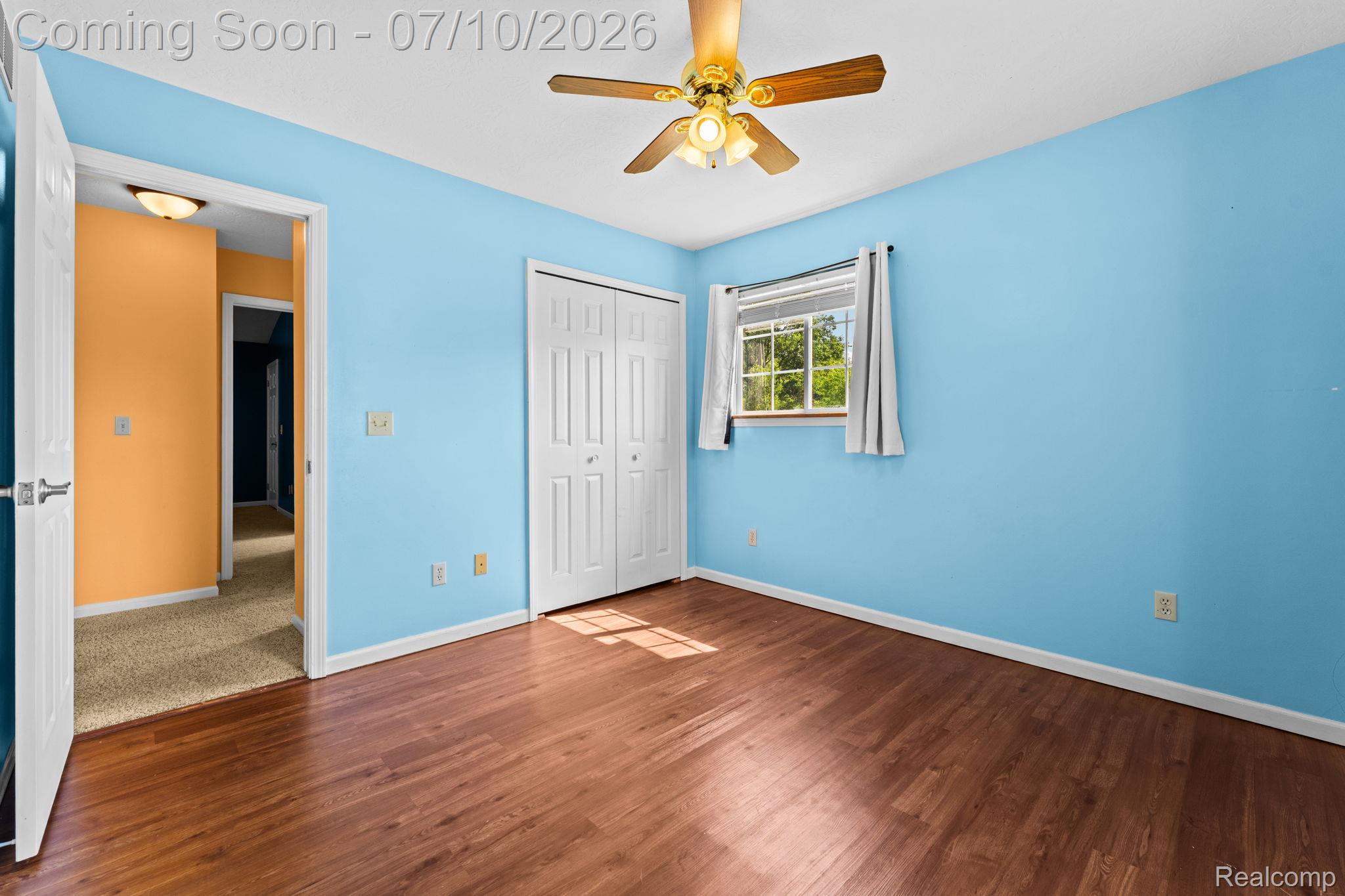 3144 North Nicholson Road Fowlerville, MI 48836 - Photo 48 of 70 Wood-finish flooring with a ceiling fan light fixture